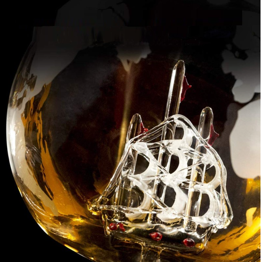 close up of inner sailboat in Globe Whiskey Decanter _Caidra Gifting _Bar Gift